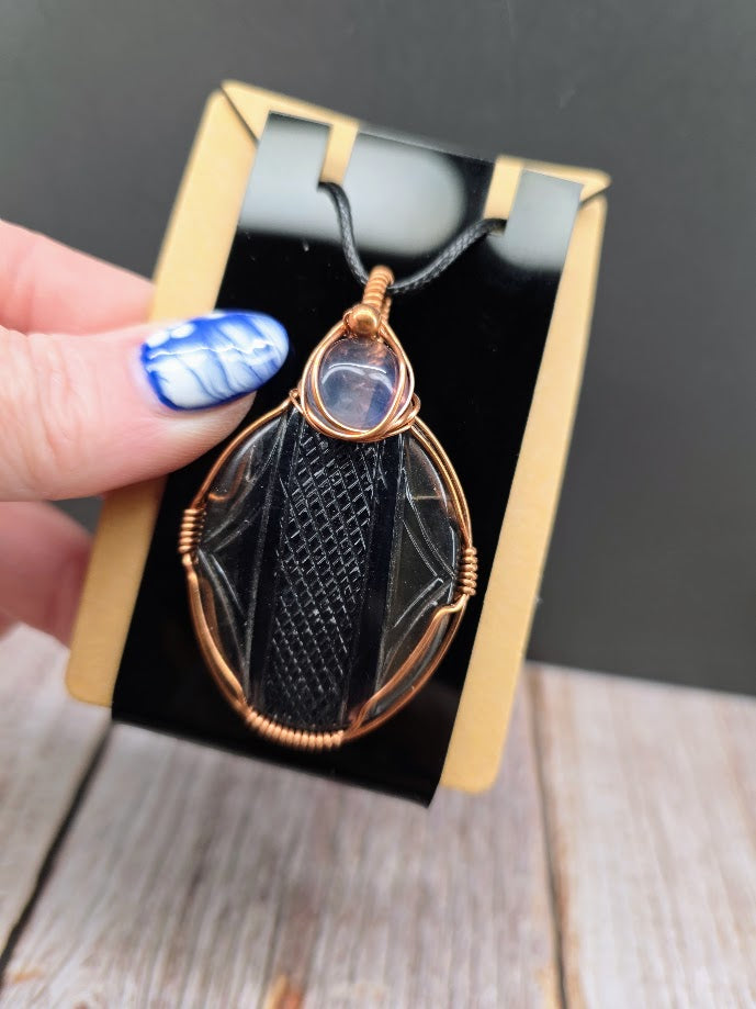 Hand Carved Fluorite Wire Wrapped Pendant